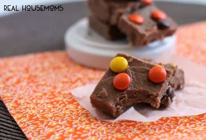 3 ingredient Reese's fudge. Fudge is displayed on a baking sheet