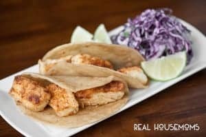 Halibut Fish Tacos served with lime and slaw an option to add to tacos