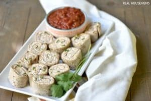 Chicken Jalapeno Popper Pinwheels are my go to appetizer for parties or potlucks!
