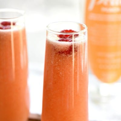 Raspberry Peach Lemonade Punch tastes so amazing and it's perfect for any celebration or brunch!