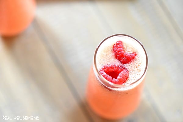 Raspberry Peach Lemonade Punch tastes amazing and it's perfect for any celebration or brunch!