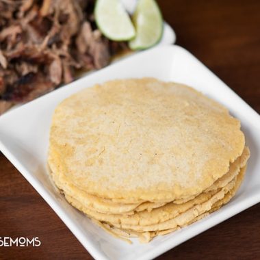 Homemade Corn Tortillas are a fun and kid friendly food to make as a family and are a great alternative prepackaged tortillas for dinner.