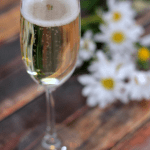 A touch of elderberry liqueur gives this champagne cocktail recipe a light floral flavor
