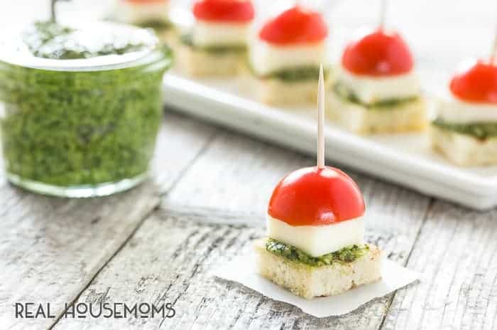 Caprese with Pesto Bites will be your go to appetizer this summer with homemade pesto that comes together in a snap!