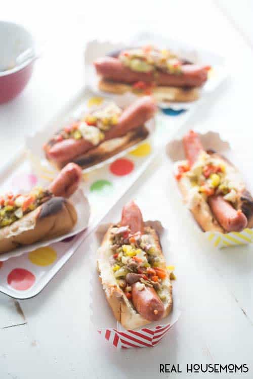 This Muffaletta Hot Dog is a great way to spruce up a BBQ staple!