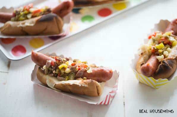 This Muffaletta Hot Dog is a great way to spruce up a BBQ staple!