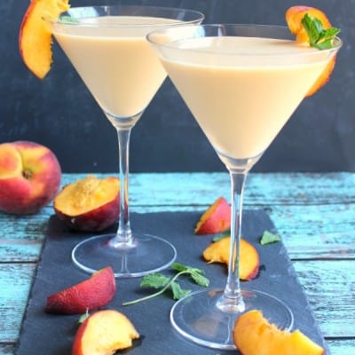 This PEACHES AND CREAM MARTINI is fun summer cocktail, perfect for sipping on the patio! This cocktail is cool, creamy and completely delicious!