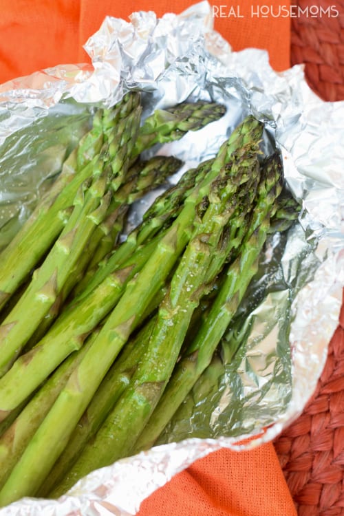 Easy Grilled Asparagus is the perfect side dish when you're grilling! Takes seconds to throw together, no mess, no fuss, and delicious!