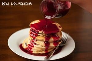 Homemade Raspberry Pancake Syrup made from fresh or frozen raspberries is a decadent breakfast treat and is excellent on chocolate chip pancakes!
