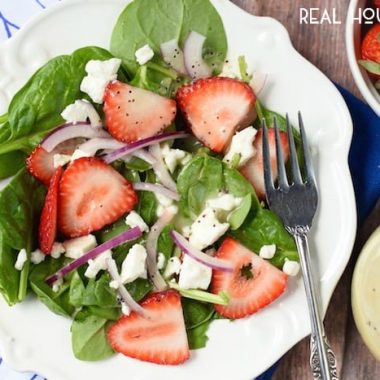 This Strawberry Feta Salad with Light Lemon Poppy Seed Dressing is absolutely perfect for summer! Your summer BBQs and picnics need this salad and lightened up dressing!