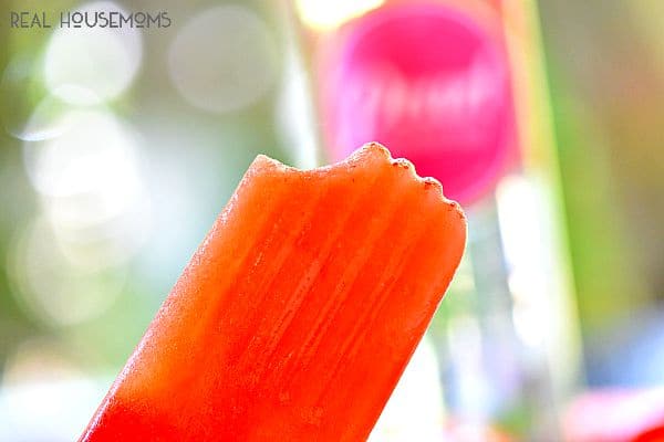 Boozy Strawberry Basil Lemonade Popsicles are crazy awesome out of this world good!!!  I love to let them melt in my summer cocktails too!