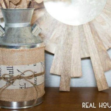 Have fun with your summer crafting by updating tin cans, paint cans or a cute galvanized milk can like this Burlap Milk Can Vase!