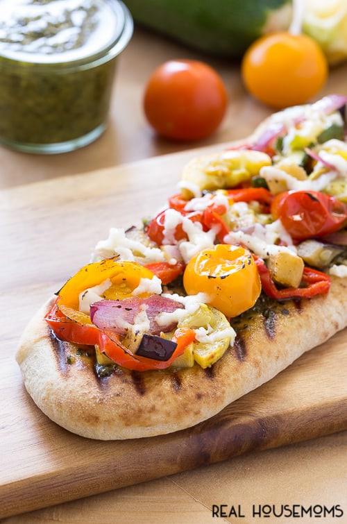 Enjoy what the season's produce has to offer and make this tasty Grilled Veggie Pesto Flatbread! 