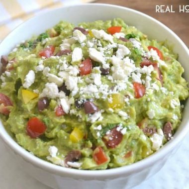 Mediterranean Guacamole combines some of my favorite flavors into one delicious dip! It's a fun twist on the original, and perfect for summer entertaining!!
