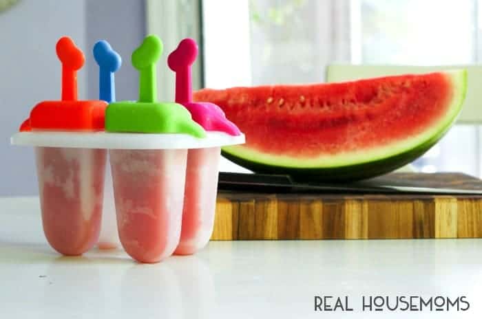 Boozy Watermelon Pops are sweet adult-only watermelon popsicles spiked with watermelon flavored vodka!
