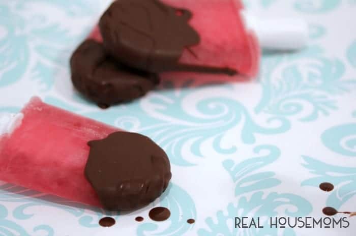 These spiked Chocolate Covered Cherry Popsicles are perfect for adults! Plus, they can easily be made without the booze, so everyone can enjoy them!