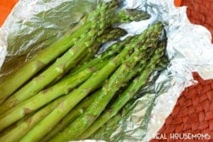 Easy Grilled Asparagus is the perfect side dish when you're grilling! Takes seconds to throw together, no mess, no fuss, and delicious!