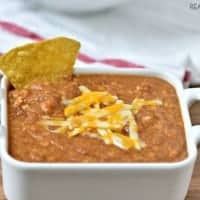 3 Ingredient Crock Pot Bean Dip is my go to football appetizer! It's crazy popular with my crowd!