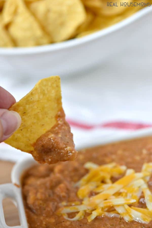 3 Ingredient Crock Pot Bean Dip is my go to football appetizer! It's crazy popular with my crowd! 