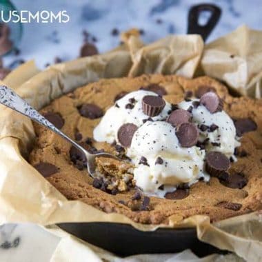 This Deep Dish Reeses Peanut Butter Cookie Skillet will beat out any restaurant skillet cookie you've ever had!