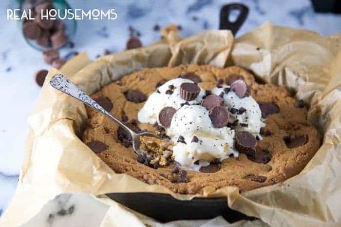 This Deep Dish Reeses Peanut Butter Cookie Skillet will beat out any restaurant skillet cookie you've ever had!