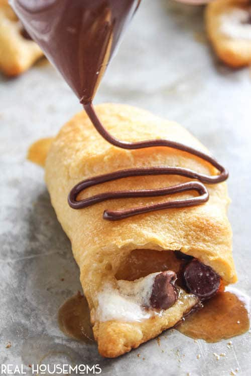 S'mores Crescent Rolls are flaky, delicious, and have all the taste of a s'mores for breakfast (or dessert)!