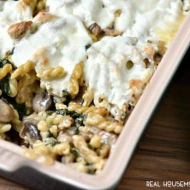 Roasted Mushroom Spinach Sausage Alfredo Pasta Bake tastes out of this world!! It's our new favorite Sunday dinner!