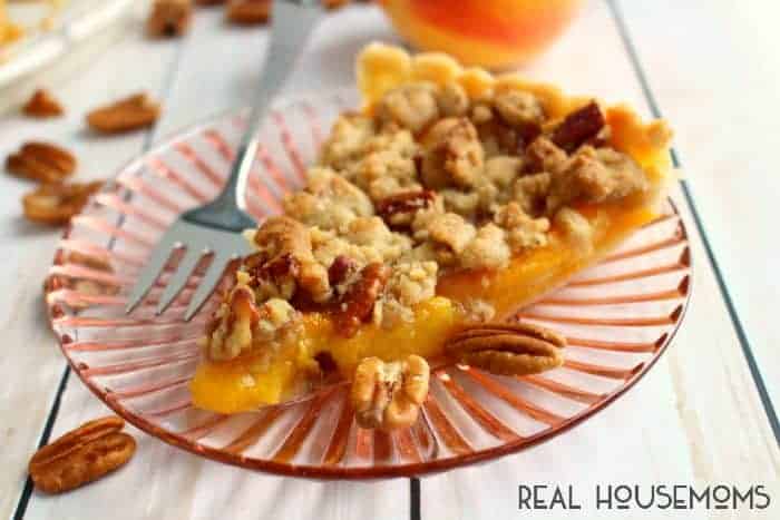 Our Peach Crumble Tart is ike peach pie, but better!! This will be your new favorite way to enjoy summer's best peaches!
