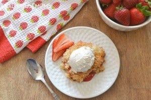 This Strawberry Colada Dump Cake is made with just 5 ingredients and oven-ready in minutes! Best of all, it feeds a crowd, and everyone will love the delicious flavor!