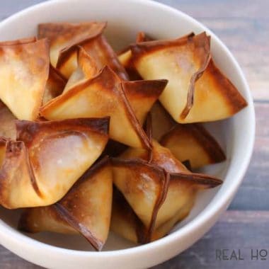 Sun Dried Tomato Wonton Bites are an easy to make party app you can prep ahead of time and bake when ready!