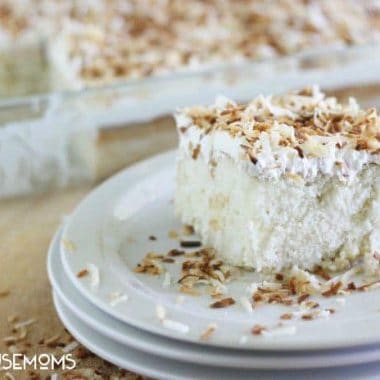 Toasted Coconut Poke Cake is a great make ahead dessert for serving a crowd!