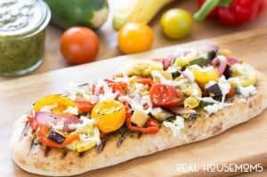Enjoy what the season's produce has to offer and make this tasty Grilled Veggie Pesto Flatbread!