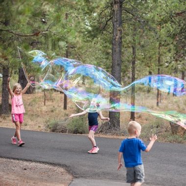 I'll tell you How to Make GIANT Bubbles with your own homemade bubble wands and solution so that kids and adults alike can enjoy immeasurable outdoor fun.