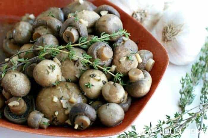 Slow Cooker Garlic Mushrooms are sure to become one of your must makes recipes!