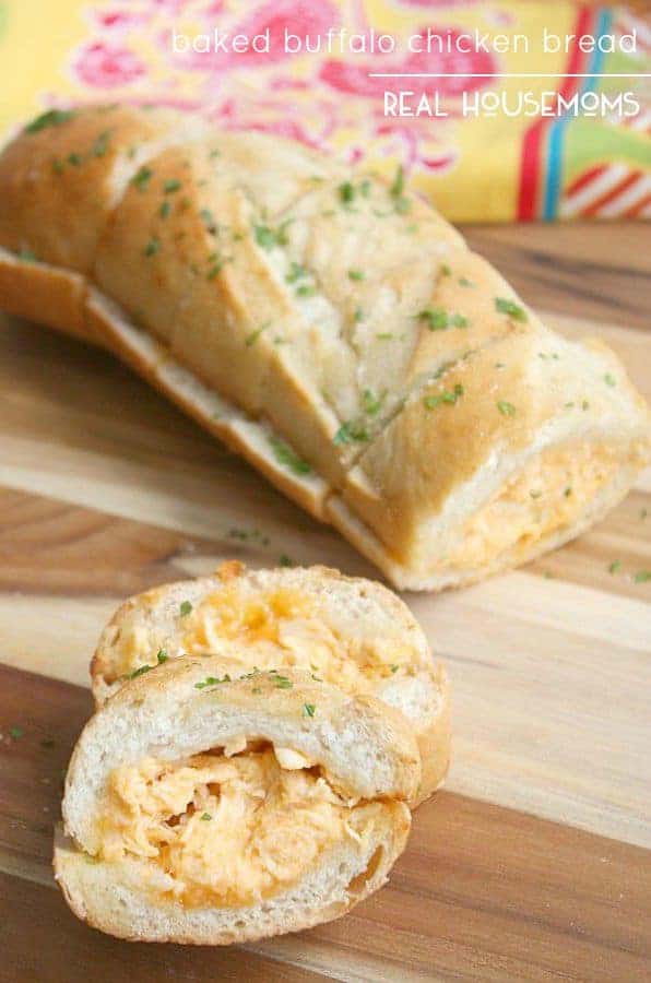 Baked Buffalo Chicken Bread is filled with cheesy buffalo chicken dip baked into a crunchy baguette. Perfect for parties!