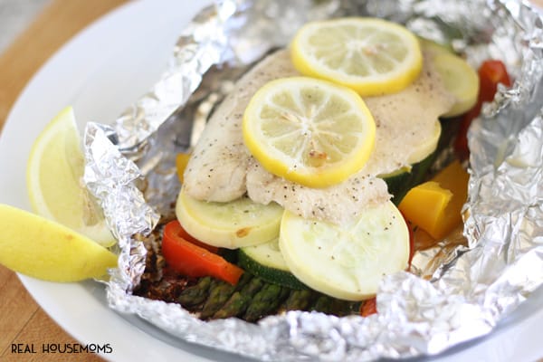 Get dinner on the table in less than 30 minutes with these Fish and Vegetable Foil Dinner!