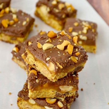 Peanut Butter Salted Caramel Bars are rich, chewy and oozing with salted caramel and peanut butter! Can you see the layers??? Yum!