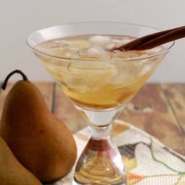 Spiced rum and sweet pears come together in this perfect for fall Spiced Pear Planter's Punch!