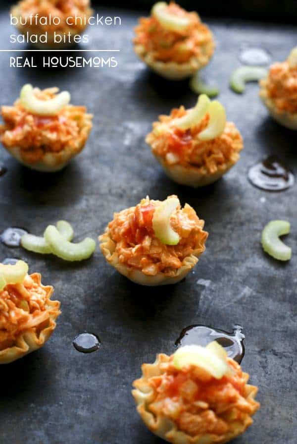 Buffalo Chicken Salad Bites are the perfect bite-sized appetizer featuring spicy buffalo chicken salad served in crisp phyllo shells!
