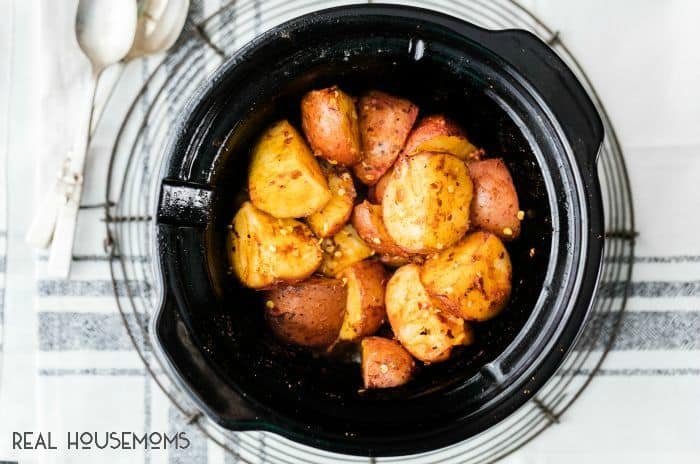 Slow Cooker Spicy Taco Potatoes are the PERFECT easy side dish for any occasion! 