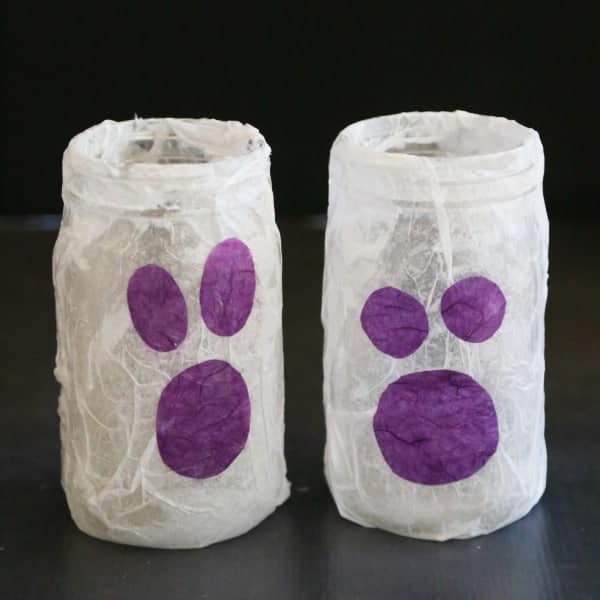 These mason jar ghost luminaries are an easy craft to do with the kids and perfect for Halloween night!