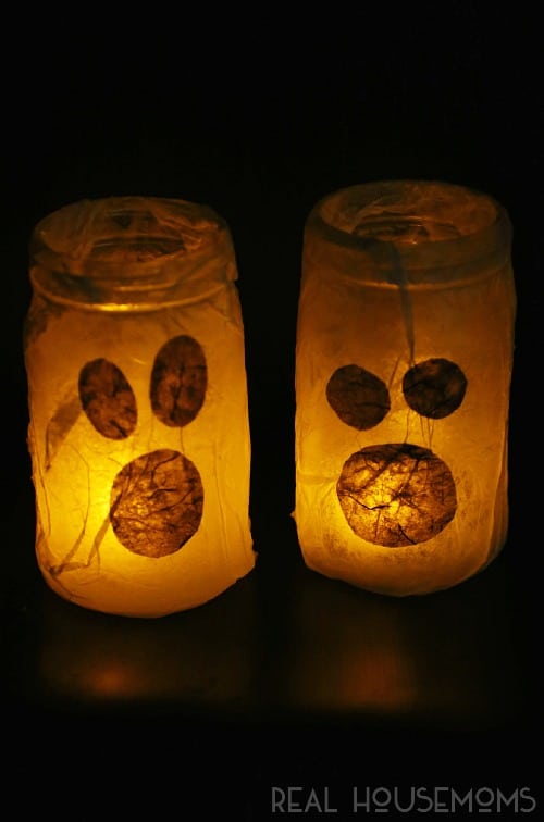 These mason jar ghost luminaries are an easy craft to do with the kids and perfect for Halloween night!