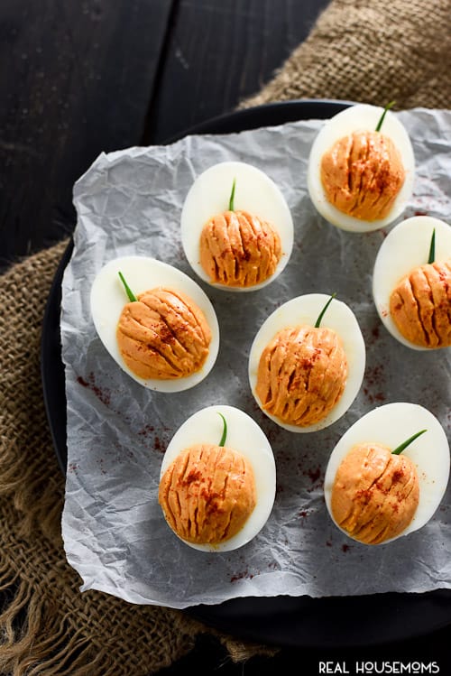 Halloween Pumpkin Deviled Eggs are totally cute, fit the occasion perfectly and taste great, too!