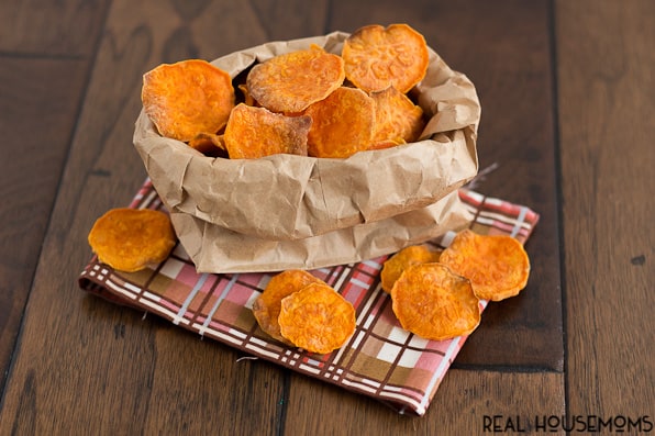 These perfectly crisp and crunchy baked sweet potato chips are an easy make at home snack that you won’t be able to resist!