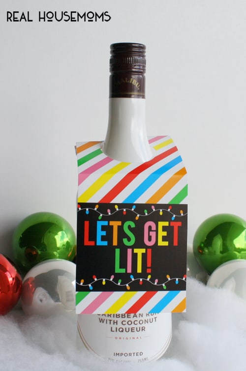 Spread a little holiday cheer to the adults in your neighborhood, friends or co-workers this year by delivering your favorite adult beverage paired with these FREE PRINTABLE HOLIDAY BOOZY BOTTLE GIFT TAGS!