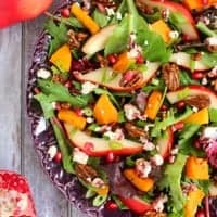 Harvest Salad with Butternut Squash is loaded with sweet flavor and crunch! Perfect for Thanksgiving, this salad is delicious and colorful!