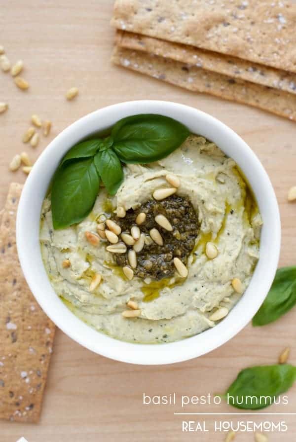 BASIL PESTO HUMMUS is an easy to make dip that has classic pesto ingredients blended in, making it a fresh and flavorful appetizer!