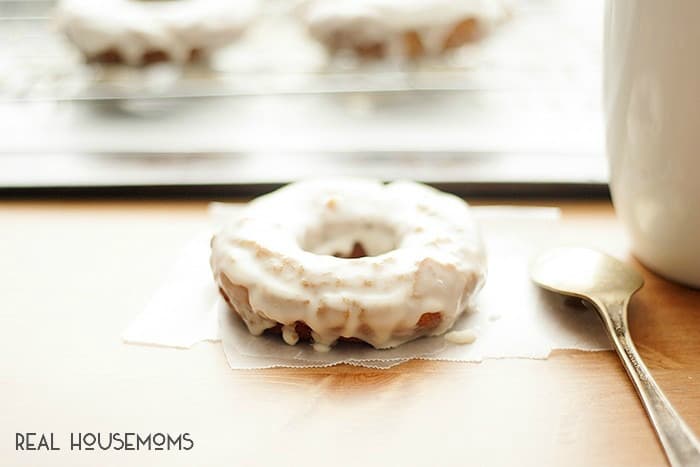 Skip going out in the cold and make these CARAMEL APPLE DOUGHNUTS yourself! They're the best sweet fall treat!