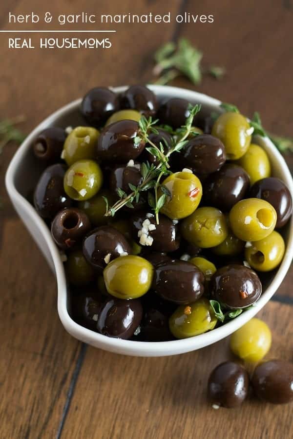 Skip the fancy olive bar this year and make your own HERB & GARLIC MARINATED OLIVES! They're nice & juicy and bursting with flavor!