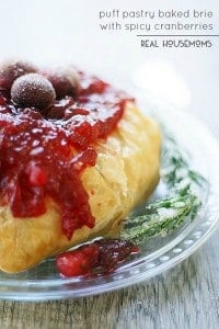 The holidays are busy enough, make entertaining easy with this elegant PUFF PASTRY BAKED BRIE WITH SPICY CRANBERRIES!